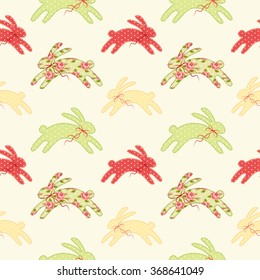 Cute vintage Easter seamless pattern with bunnies as retro fabric patch applique in shabby chic style, can be used for kitchen textile, table cloth design, bed linen texture etc