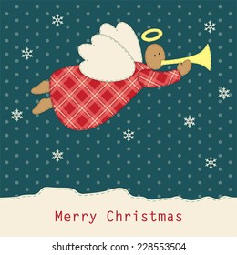 Cute vintage patchwork Christmas angel with horn ideal as greeting card