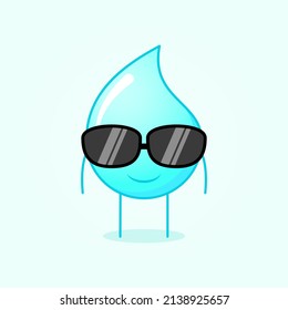 cute water cartoon with smile expression and black eyeglasses. yellow and orange. suitable for logos, icons, symbols or mascots. blue and white