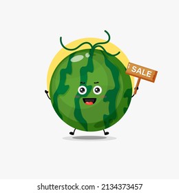 Cute watermelon character with sale sign