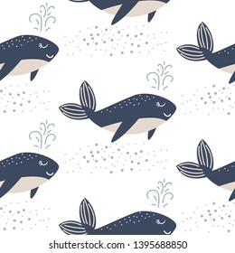 Cute whale seamless vector pattern. Cartoon style blue fun fish background. Sea life animal kid print.