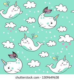 Cute whale unicorn seamless pattern on a blue background