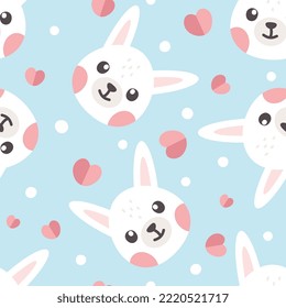 Cute white bunny with hearts and dots, kids seamless pattern background, blue vector design for wrapping paper, fabric and textile print.