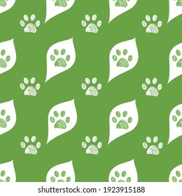 
Cute white leaves and doodle paw prints with green background. Fabric design seamless nature pattern