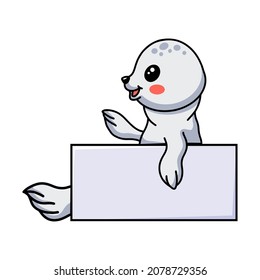 Cute white little seal cartoon with blank sign