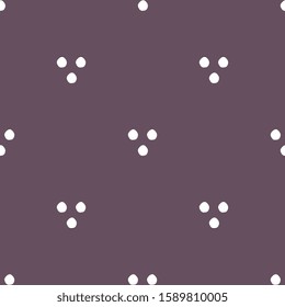 Cute white polka dots on a purple background. Vector seamless pattern. Fashionable illustration.