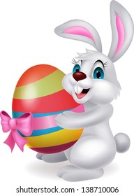 Cute white rabbit with easter egg