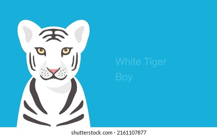 Cute white tiger cub standing on the ground and watching