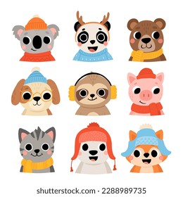 Cute wild and domestic animals set in winter clothes, including brown bear, polar bear, panda, koala, sloth, cat, dog, pig, fox. Cartoon kids illustration with hats and sweaters.