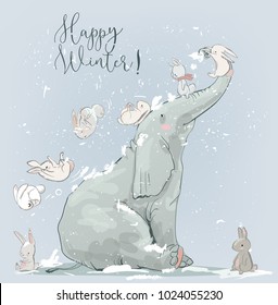 cute winter elephant with hares