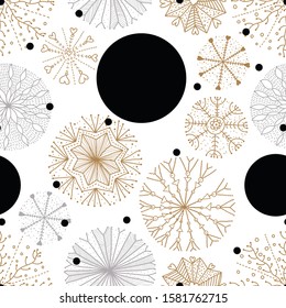 Cute winter seamless pattern with gold decorative snowflakes and polka dots. Can be used in textile industry, paper, background, scrapbooking.