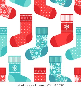 Cute winter seamless pattern with socks in traditional colors