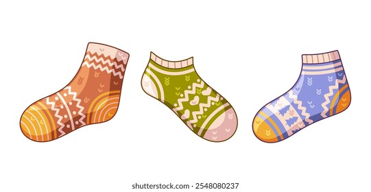 Cute winter warm knitted socks for children decorated with traditional Christmas ornaments set