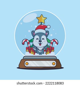 Un lobo lindo en el globo nevado. Dibujo de caricaturas de navidad.