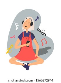 Cute woman with headphones sitting cross-legged and listening to music. She looking at playlist from smartphone. Music symbols included.