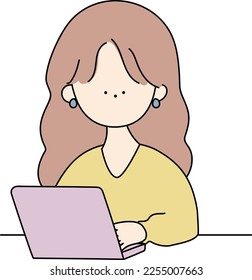una mujer guapa que maneja una computadora