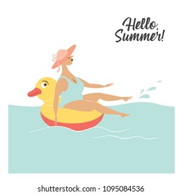 cute woman swim in inflatable  duck