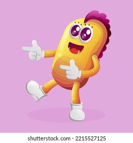 Cute yellow monster playful with pointed hand. Perfect for kids, small business or e-Commerce, merchandise and sticker, banner promotion, blog or vlog channel
