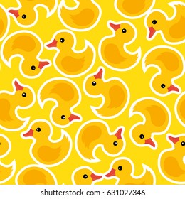 Cute yellow rubber ducks seamless pattern