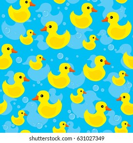 Cute yellow rubber ducks seamless pattern