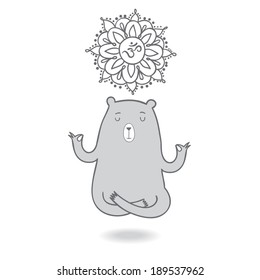 Cute yoga bear meditating in lotus position with om symbol.