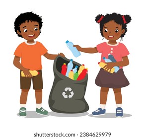 Cute young African kids collecting and picking up plastic bottles into garbage bag for recycling help to protect save environment