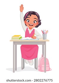 Cute young Arab Middle Eastern school girl student sitting at a desk, raising her hand in class and writing. Cartoon vector illustration isolated on white background.