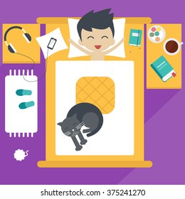 Cute young boy is waking up in his bed. Bedroom interior.