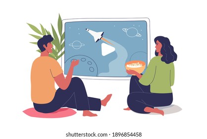 Cute young couple watching tv at home vector cartoon illustration. Romantic couple sitting on some floor pillows and watching a sci-fi movie about space travel