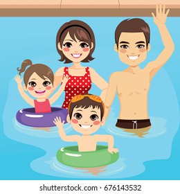 Cute young family happy together at swimming pool