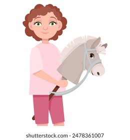 Cute young girl with toy horse head for hobbyhorsing