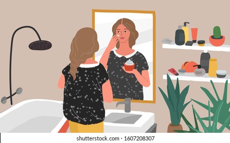 Cute young woman care for her skin, standing in front of mirror, cleansing or moisturizing skin. Daily life skincare routine in bathroom interior with homeplants. Cartoon vector illustration