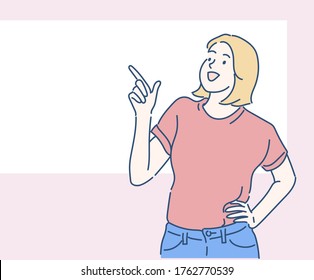 Cute young woman pointing finger up. Hand drawn in thin line style, vector illustrations. 