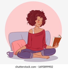 Cute, young woman reading a book 