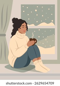 Cute young woman in a warm sweater with a cup of cocoa by the window. Winter, snow outside. Vector illustration scene of coziness, warmth, home and tranquility. Use for holidays, women's projects
