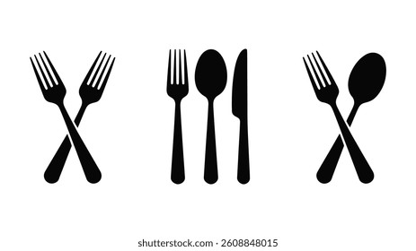 Cutlery Arrangement: A minimalist, artistic collection of black forks, spoons, and knives on display. Designed for kitchen and eating concepts. 
