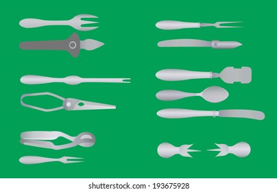 Cutlery for delicacies on a green background