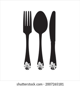 cutlery logo for a restaurant with Balinese carving motifs