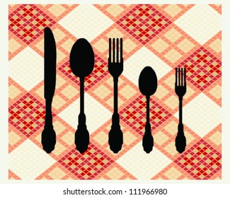 Cutlery on colorful tablecloth-vector