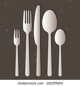 Cutlery on gray background