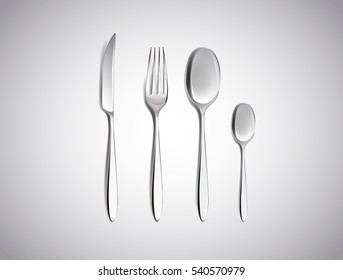 Cutlery Set of Silver Forks Spoons and Knifes Top View Isolated on White Background. Table Setting.