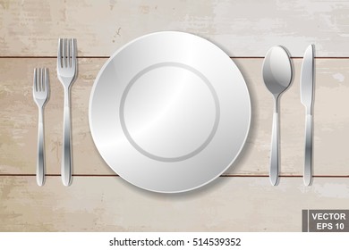 Cutlery. Spoon, fork, knife and plate. Serving. Preparing for dinner.
