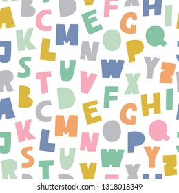 Cutout ABC seamless pattern. Cute alphabet. Playful font print for textile, home decor, kids room wall art. Soft pastel colors – pink, blue, yellow.