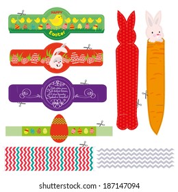 Cut-out easter paper napkin rings with bunnies, chickens, easter eggs and chevron pattern