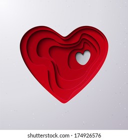 Cutout layered red paper heart with the place where love lives for Valentines day.
