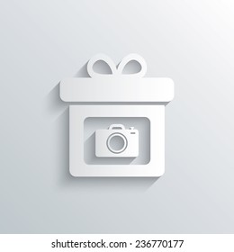 Cutout paper background. Gift box sign icon. Present with photo camera symbol. White poster with icon. Vector