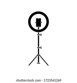 Cutout silhouette Led ring lamp on tripod with smartphone. Outline icon. Black simple illustration of light for selfie, blogger. Flat isolated vector image on white background