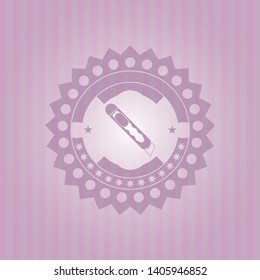 cutter icon inside badge with pink background
