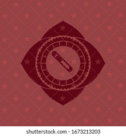 icono de cortadora dentro de la placa con fondo rojo