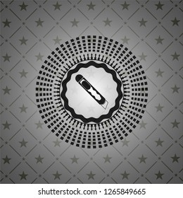 cutter icon inside black badge